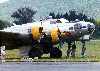 B17 bomber being prepared for takeoff