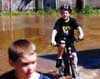 Kid riding bike down main road of South Bound Brook.